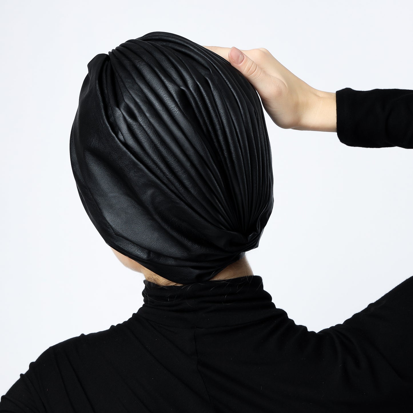 Gathering leather turban